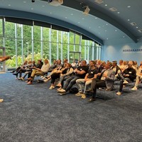 Teilnehmer im Audimax